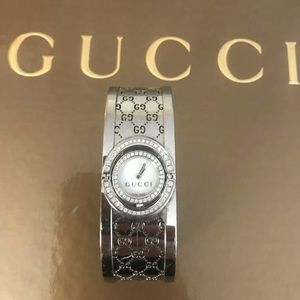 Gucci twirl face watch, mother of Perl and diamond